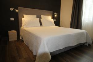 Postel nebo postele na pokoji v ubytování INSULA FELIX Bed&Breakfast