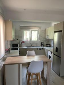 Kuchyň nebo kuchyňský kout v ubytování Villa Boltado