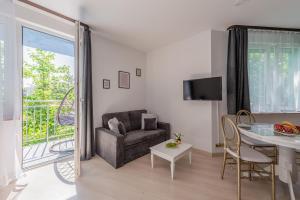 Posedenie v ubytovaní Apartament z balkonem Lazur 250m od morza