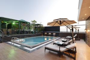 a swimming pool on the roof of a building at Fortune Ranjit Vihar, Amritsar - Member ITC Hotels' Group in Amritsar