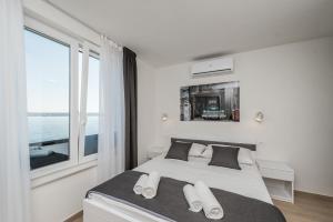 Posteľ alebo postele v izbe v ubytovaní Luxury Villa Solis