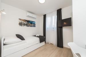 Posteľ alebo postele v izbe v ubytovaní Luxury Villa Solis
