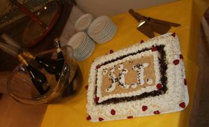 a cake sitting on top of a table at Hotel Tiziana in Rimini