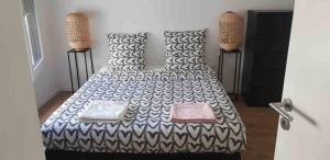 Zdjęcie z galerii obiektu Superbe apt, parking gratuit, proche ligne 13&14, idéal famille & vue Montmartre ! w mieście Saint-Ouen