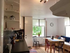 A restaurant or other place to eat at Holiday home MOTALA VI