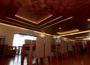 TV in/ali zabaviščno središče v nastanitvi Syailendra Hotel Syariah