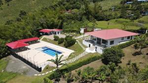 an aerial view of a house with a swimming pool at FINCA LAS MARÍAS 2 in Vergara