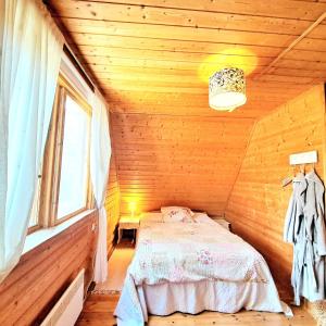 Voodi või voodid majutusasutuse Lootuse Spa toas