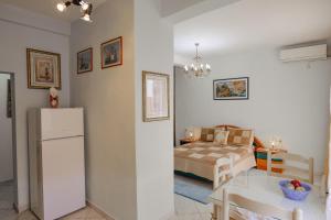 Η κουζίνα ή μικρή κουζίνα στο Thimios Rooms