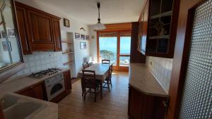 Køkken eller tekøkken på Magica Vista Lago