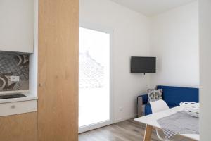 A television and/or entertainment centre at CASA MAIOLICA