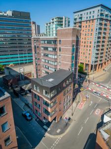 an aerial view of a city with tall buildings at 123 Queen Street - Home Crowd Luxury Apartments in Sheffield