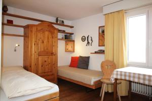 Ένα ή περισσότερα κρεβάτια σε δωμάτιο στο Residenza Lagrev Studio Nr 303 - Typ 10A - 3 Etage - Ost