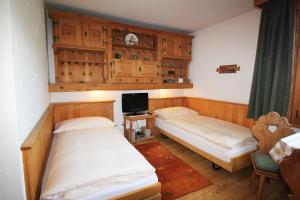 Postel nebo postele na pokoji v ubytování Residenza Lagrev Studio Nr 213 - Typ 10A - 2 Etage - Ost