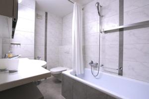 Koupelna v ubytování Residenza Lagrev 1 Zimmerwohnung Nr 228 - Typ 11A - 2 Etage - Ost
