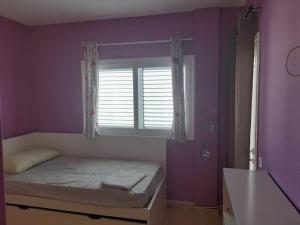 Postel nebo postele na pokoji v ubytování alemar