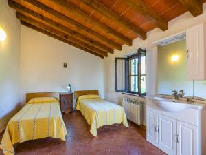 Posteľ alebo postele v izbe v ubytovaní Holiday Home Grilli by Interhome
