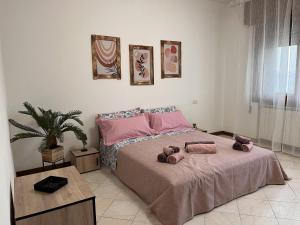 Ornella's apartment - Relax near Venice tesisinde bir odada yatak veya yataklar