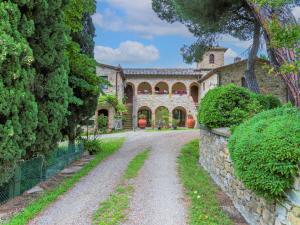 A garden outside Holiday Home Cellole - Valluccia by Interhome