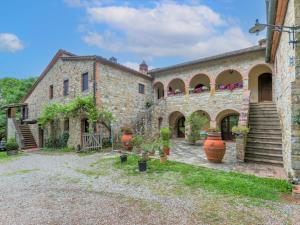 A garden outside Holiday Home Cellole - Valluccia by Interhome