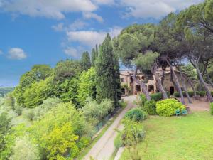 A garden outside Holiday Home Cellole - Valluccia by Interhome