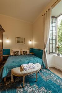 Manoir de Laroque Delprat客房内的一张或多张床位