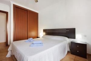 Postel nebo postele na pokoji v ubytování Casa Carlos