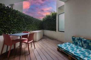 A balcony or terrace at Luxury garden apartment 2BR in the best development of Cap d'Antibes-Juan les Pins