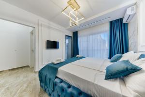 Ένα ή περισσότερα κρεβάτια σε δωμάτιο στο Villa AS +34 φωτογραφίες