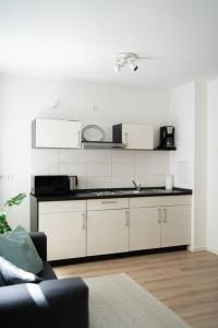 Dapur atau dapur kecil di Cosy, Centre apartment