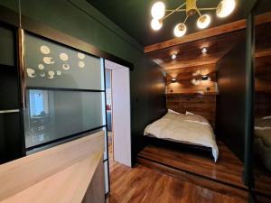 Voodi või voodid majutusasutuse Genève - Logement Fastueux toas