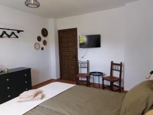 A bed or beds in a room at Casa Loko