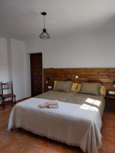 A bed or beds in a room at Casa Loko
