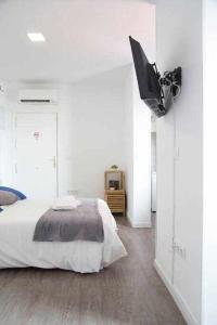 Łóżko lub łóżka w pokoju w obiekcie Comodo y agradable estudio en Madrid centro A6