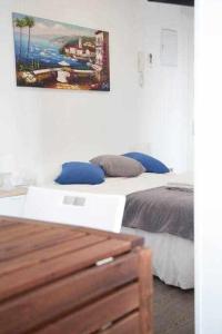 Łóżko lub łóżka w pokoju w obiekcie Comodo y agradable estudio en Madrid centro A6