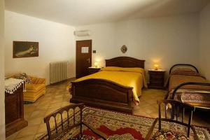 Postel nebo postele na pokoji v ubytování Agriturismo San Giuseppe