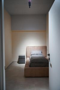Postel nebo postele na pokoji v ubytování Boomerang apart-apart hotel