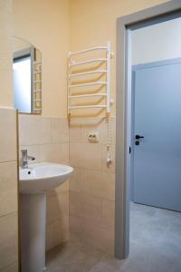 Koupelna v ubytování Boomerang apart-apart hotel