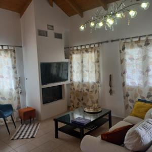 Μια τηλεόραση ή/και κέντρο ψυχαγωγίας στο Villa Melody