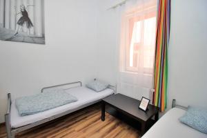 Posteľ alebo postele v izbe v ubytovaní Hostel Cinnamon