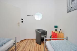 Posteľ alebo postele v izbe v ubytovaní Hostel Cinnamon