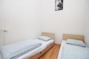 Posteľ alebo postele v izbe v ubytovaní Hostel Cinnamon
