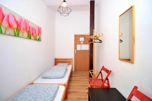 Posteľ alebo postele v izbe v ubytovaní Hostel Cinnamon
