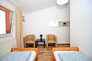 Posteľ alebo postele v izbe v ubytovaní Hostel Cinnamon
