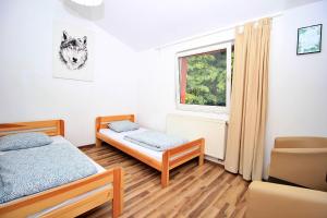 Posteľ alebo postele v izbe v ubytovaní Hostel Cinnamon