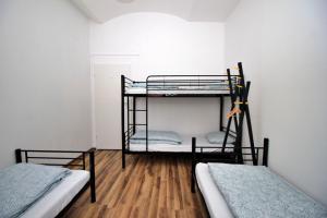 Posteľ alebo postele v izbe v ubytovaní Hostel Cinnamon
