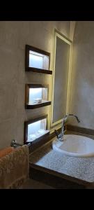 a bathroom with a sink and a mirror at ميراج باى in Safaga
