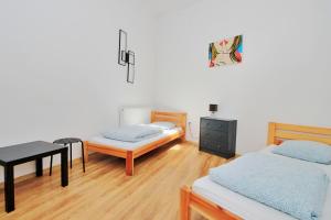 Posteľ alebo postele v izbe v ubytovaní Hostel Cinnamon