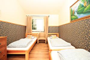 Posteľ alebo postele v izbe v ubytovaní Hostel Cinnamon