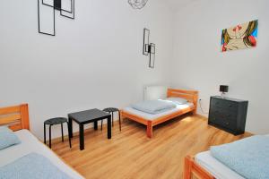 Posteľ alebo postele v izbe v ubytovaní Hostel Cinnamon